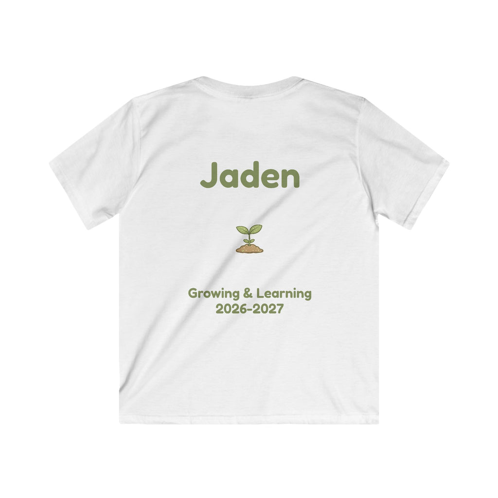 A white short-sleeve t-shirt shown from the back, featuring a custom printed design with the name 'Jaden' in olive green, a small sprout graphic, and the text 'Growing & Learning 2026-2027' in olive green.