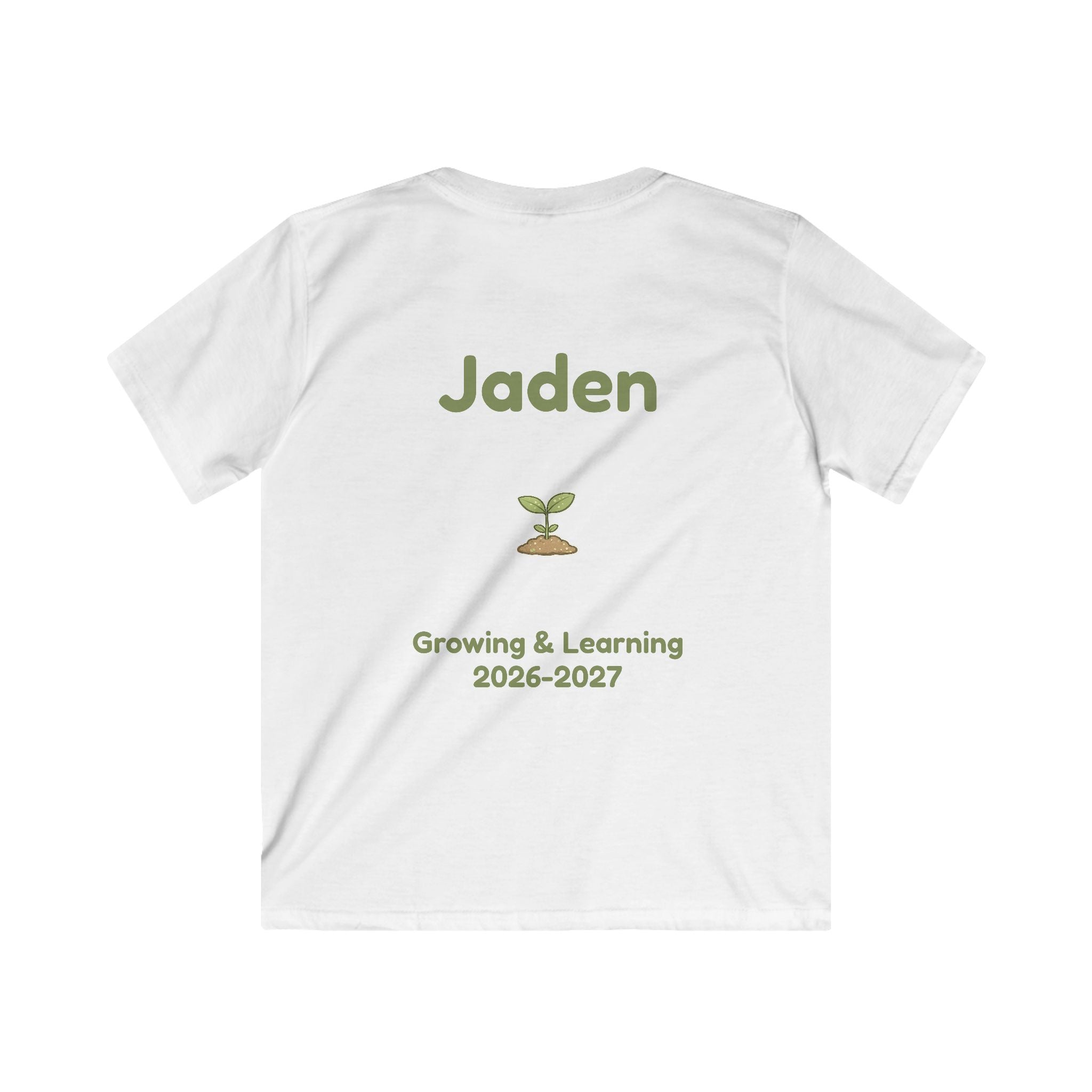 A white short-sleeve t-shirt shown from the back, featuring a custom printed design with the name 'Jaden' in olive green, a small sprout graphic, and the text 'Growing & Learning 2026-2027' in olive green.